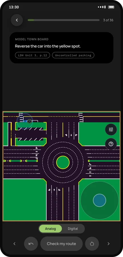 The Model Town Board simulator with a car reversing into a parking bay